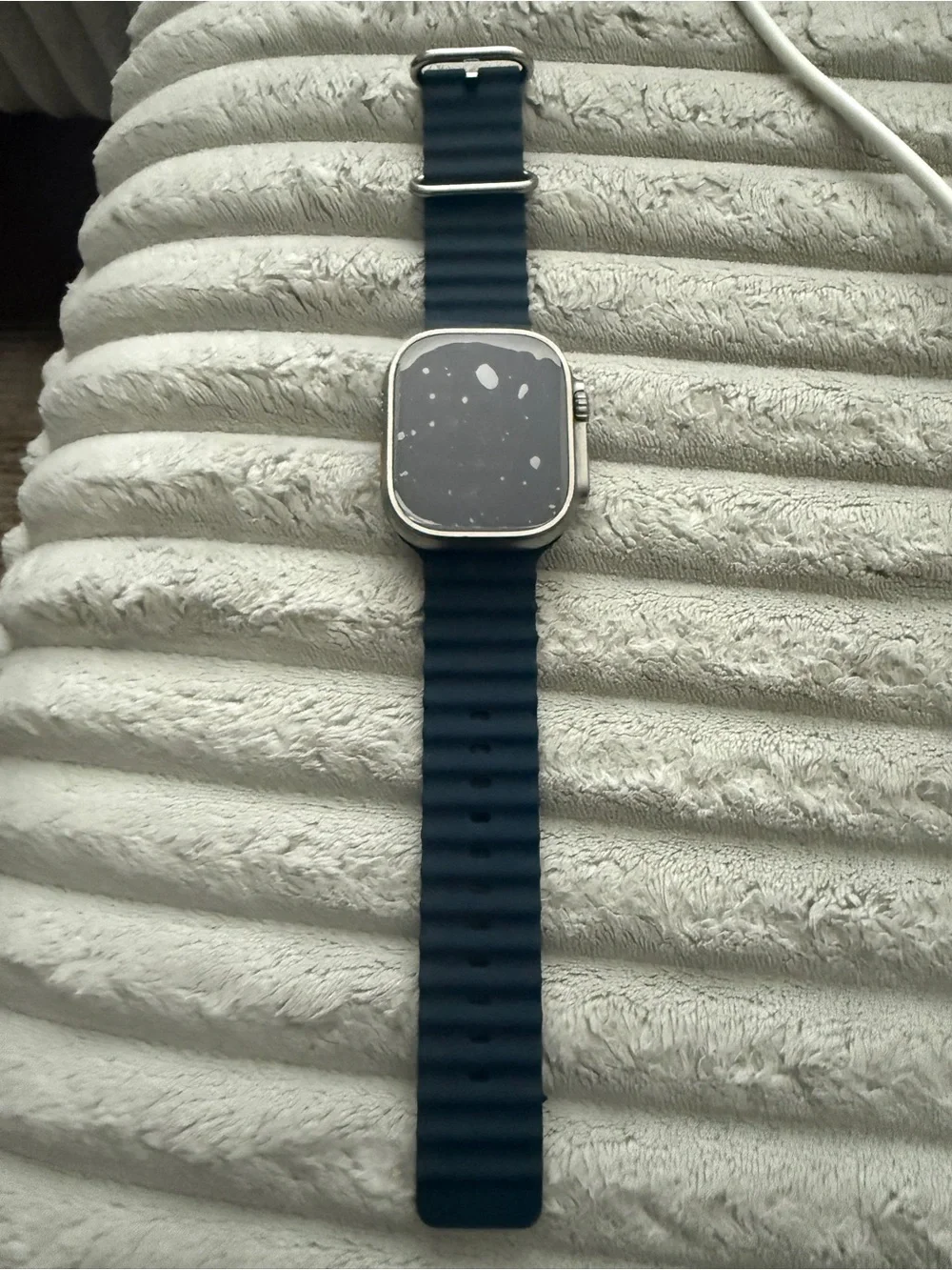 Apple Watch Ultra new - refurbishedwith Navy Silicone Strap and Magnetic Charger